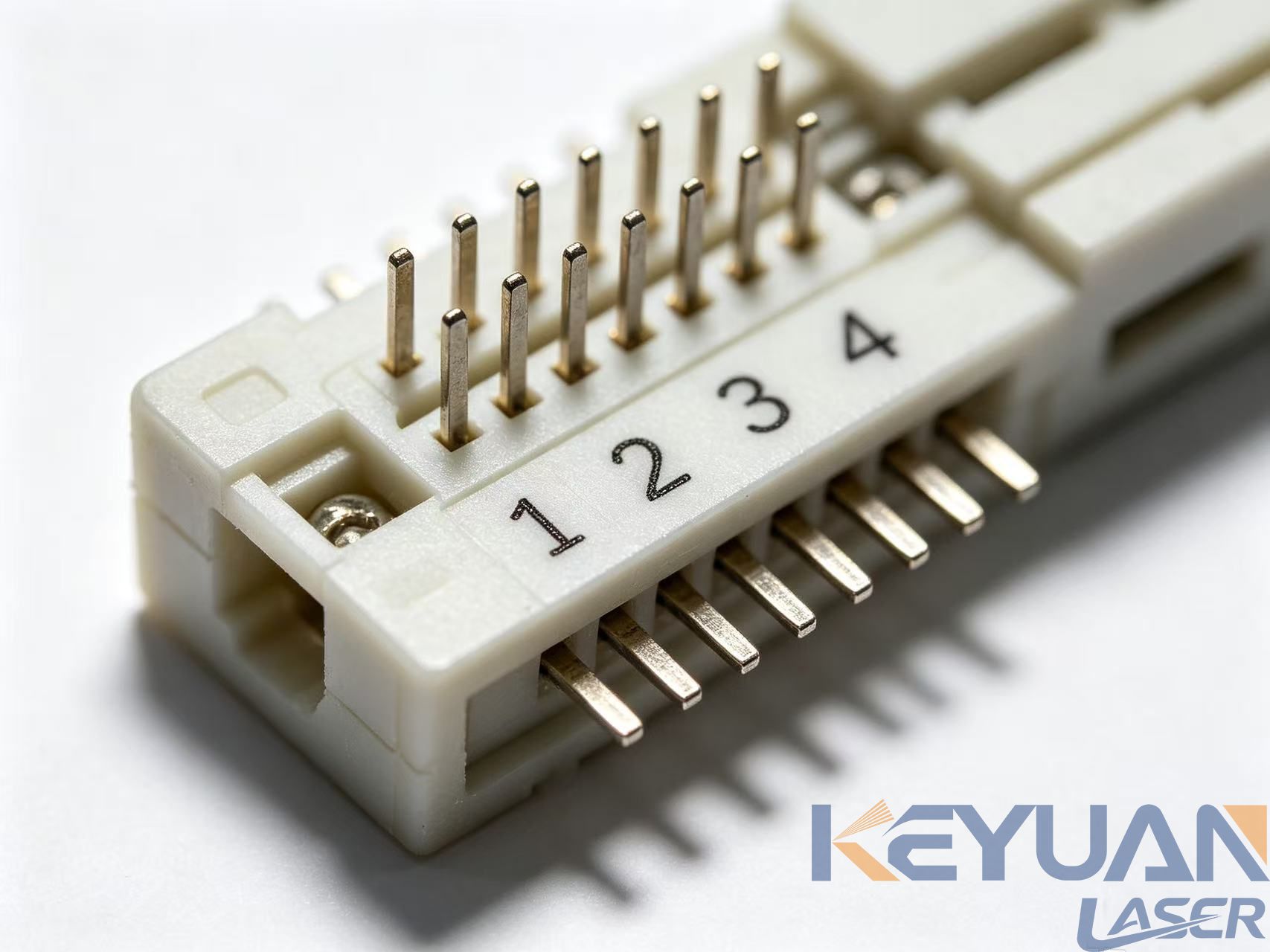 UV Laser Marking for Small Electronic Connectors With Ultra Fine Text